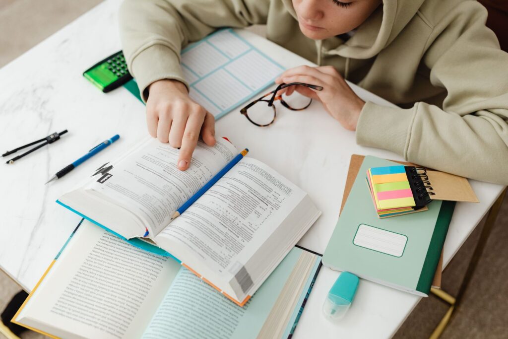 Last minute CFA exam preparation - student studying at desk